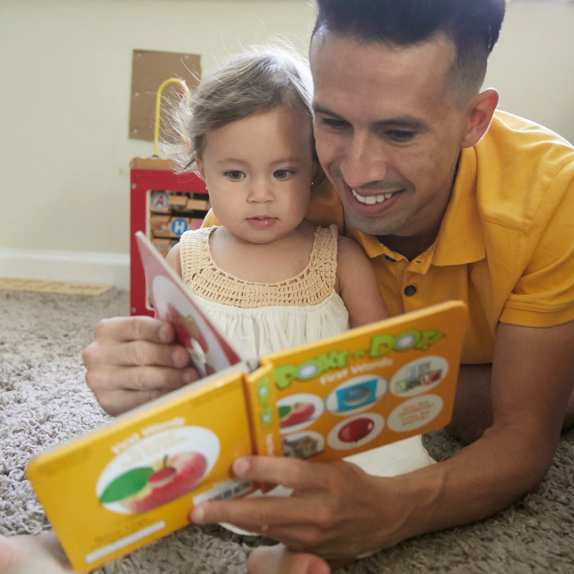 Poke-a-Dot: First Words Board Book